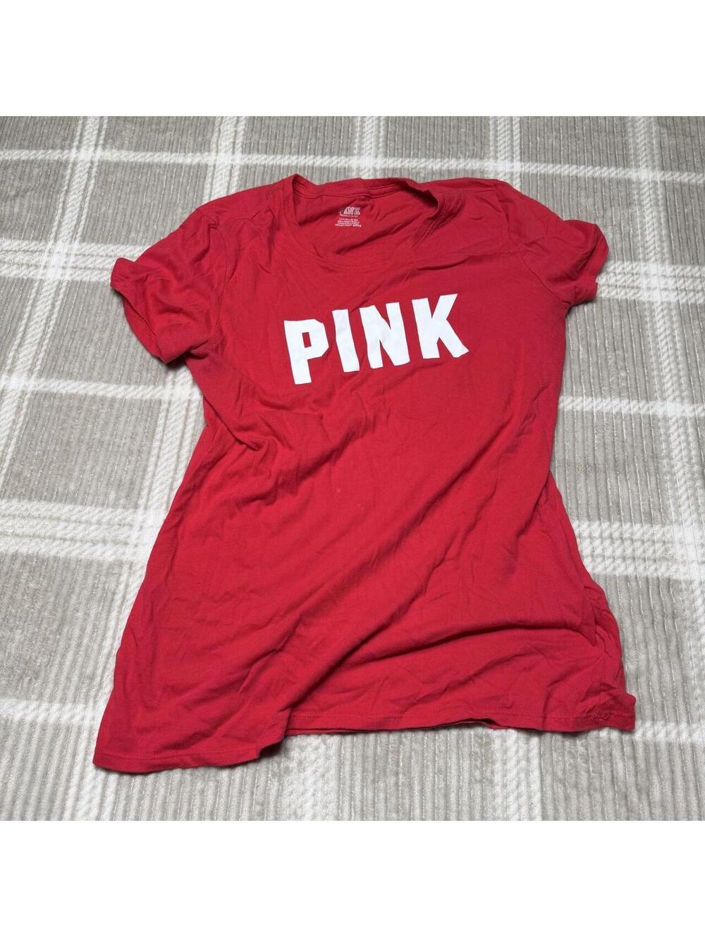 Victoria's Secret PINK red t-shirt with white text reading 'PINK'